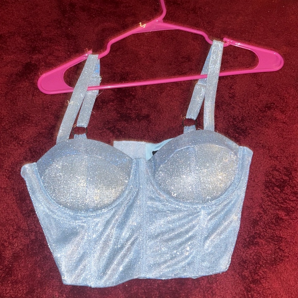 Glittery blue crop top.